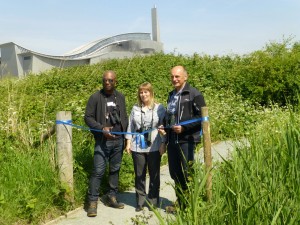 David, Karen and Andy prepare to cut the ribbon