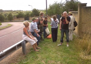 Braeburn tour participants included former Bexley Biodiversity Officer John Archer (second left), Parks, Open Spaces and Nature Conservation Officer Mark Taylor (third left)  and LWT's head of Planning and Policy Mathew Frith (second right), seen here looking at the geological SSSI by the housing estate access road. 