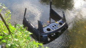 Section of cut-up mini dumped in the Cray, downstream of the Crayford town centre. (Photo: Ron Pearson)