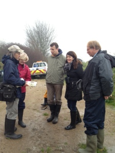 Chris Rose (ThamesRoad Wetland Site Manager) shows Crossness participants Ann, Paul, Donna and Mike a Harvest Mouse nest whilst discussing the plan of action. (Photo: Karen Sutton) 