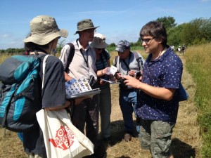 Participants discuss species identification. 'Bexley Wildlife' contributor Purnendu Roy, who discovered a new species of butterfly in India, on the right. 