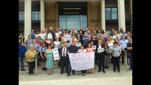 Old Farm Park campaigners, taking part in a photocall before presenting a petition to full Council on July 15th, had to respond quickly to key decision-making dates unexpectedly being brought forward. 