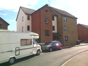 This building has three House Martin nests on it, in somewhat more vulnerable locations than the others, so it is good to see that they are being welcomed by the residents. (Photo: Chris Rose) 